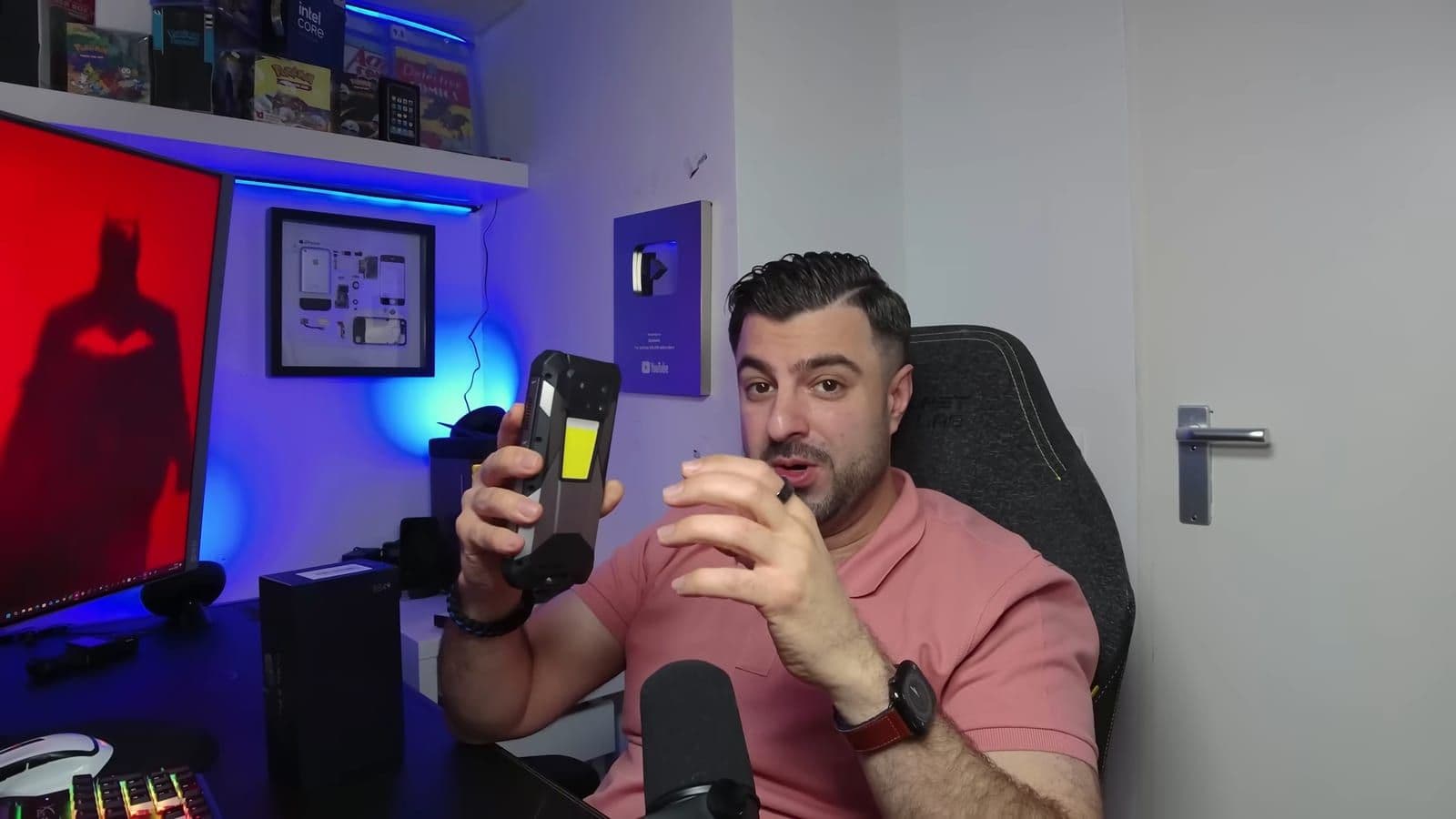 Zino holding the rugged rear casing of the 8849 Tank 4 Pro showing the large camping light