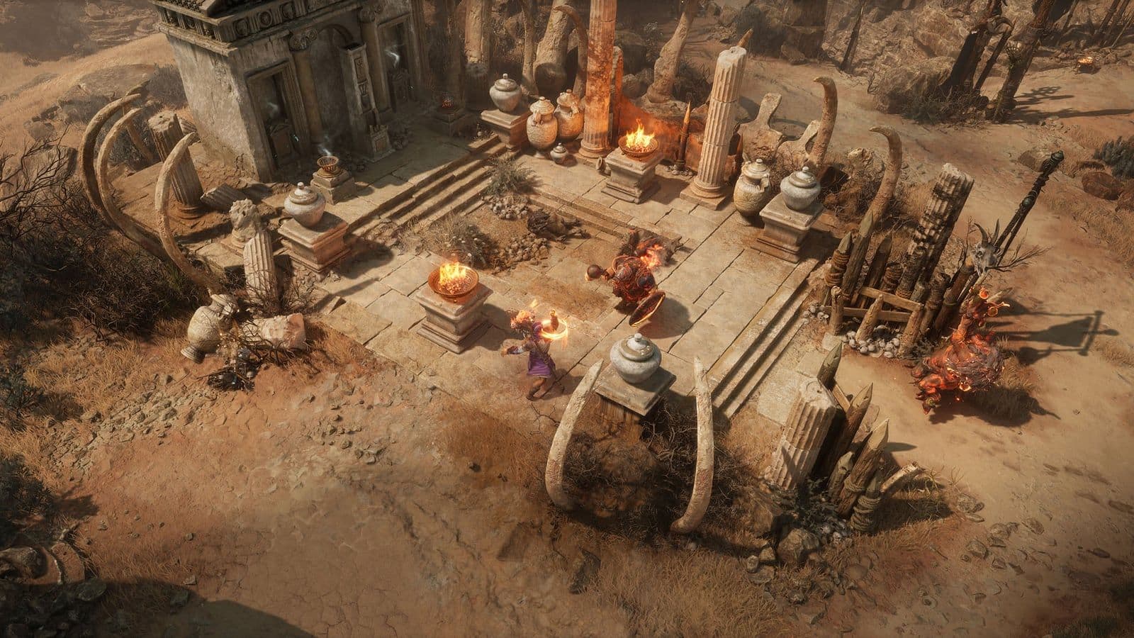 Screenshot van een gevecht bij een stenen altaar met vuurkorven in Titan Quest II