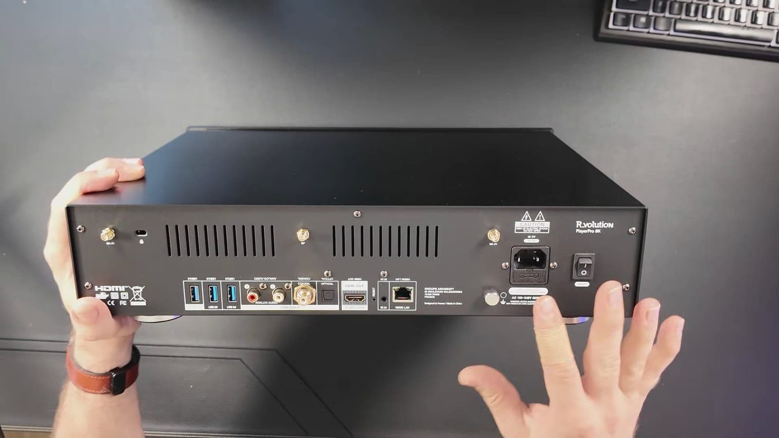 R_VOLUTION PlayerPro 8K rear panel ports including dual HDMI outputs, USB 3.0, Gigabit Ethernet, and coaxial